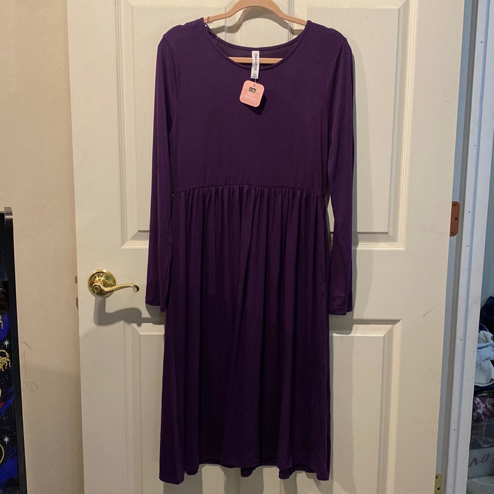 Long sleeve purple baby doll style dress!